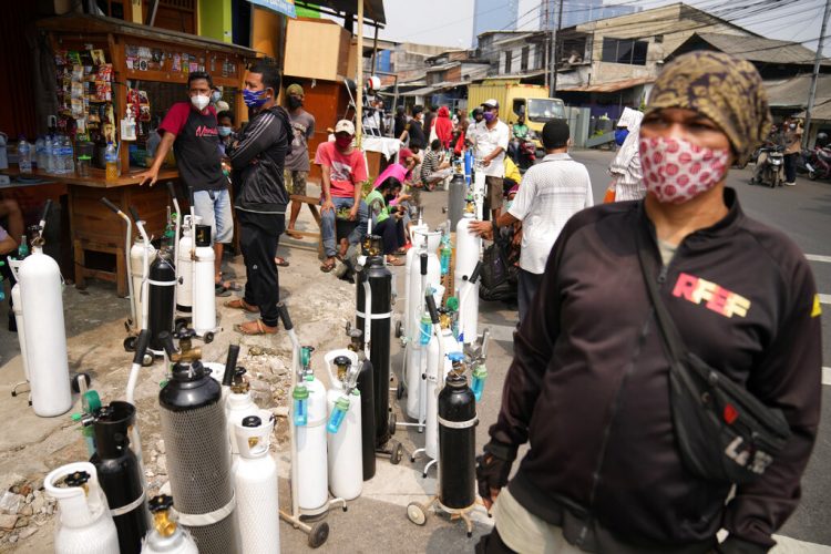 Fri. 8:46 a.m.: Lockdowns in Asia as some nations see 1st major virus surges